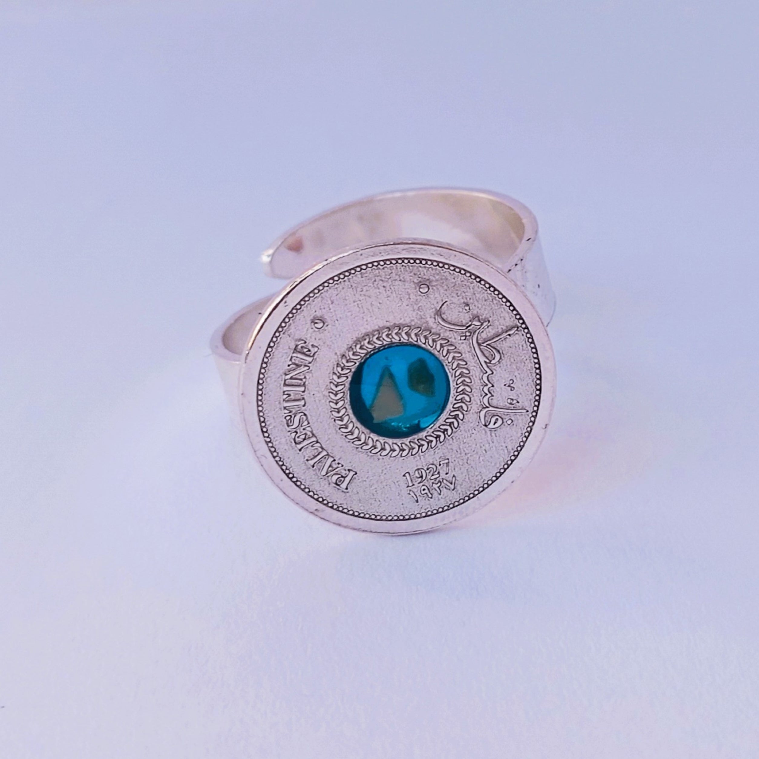 Silver coin ring with stones from different cities. Handmade in Palestine. Fair trade