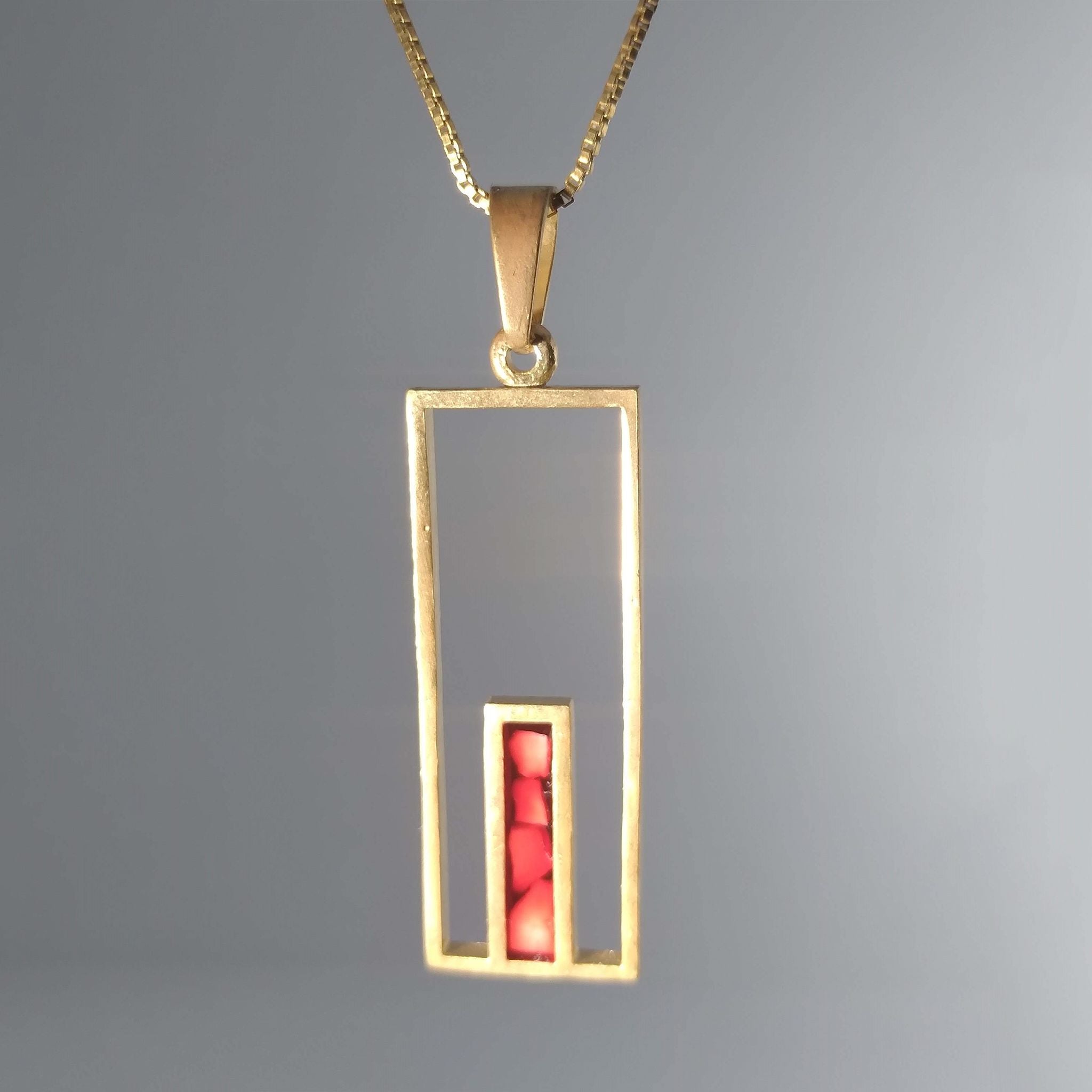 Jerusalem Gate Necklace with a red stone from a Palestinian city