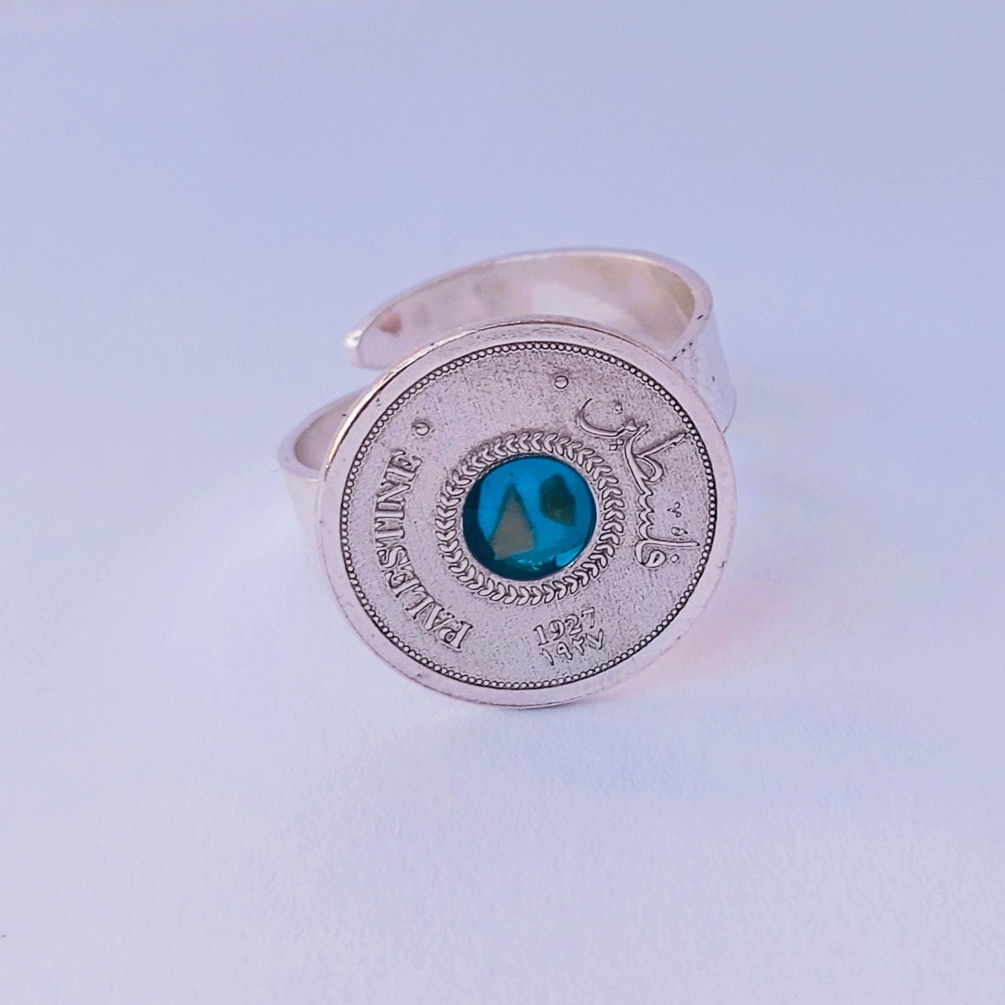 Palestinian coin ring with blue stone 