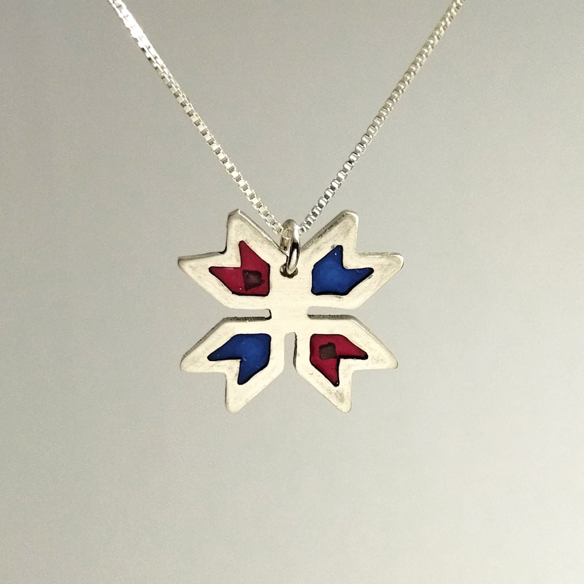 Silver Canaan Star Necklace inspired by the ancient Canaanite star, blue and red stones