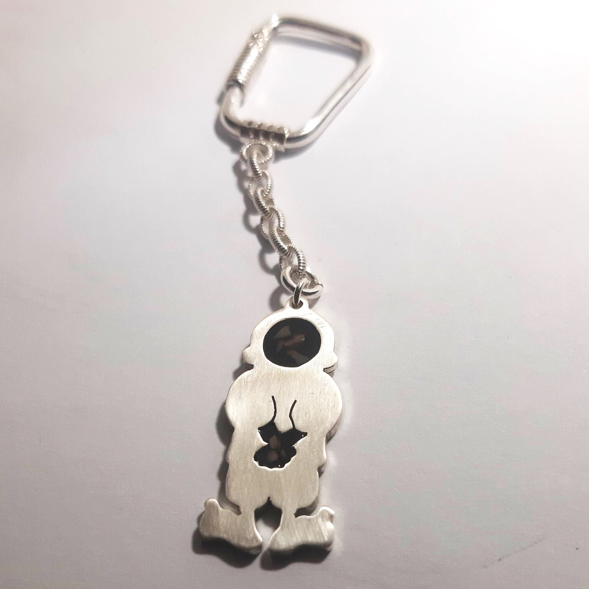 handalah shaped keychain with  black customized stones 
