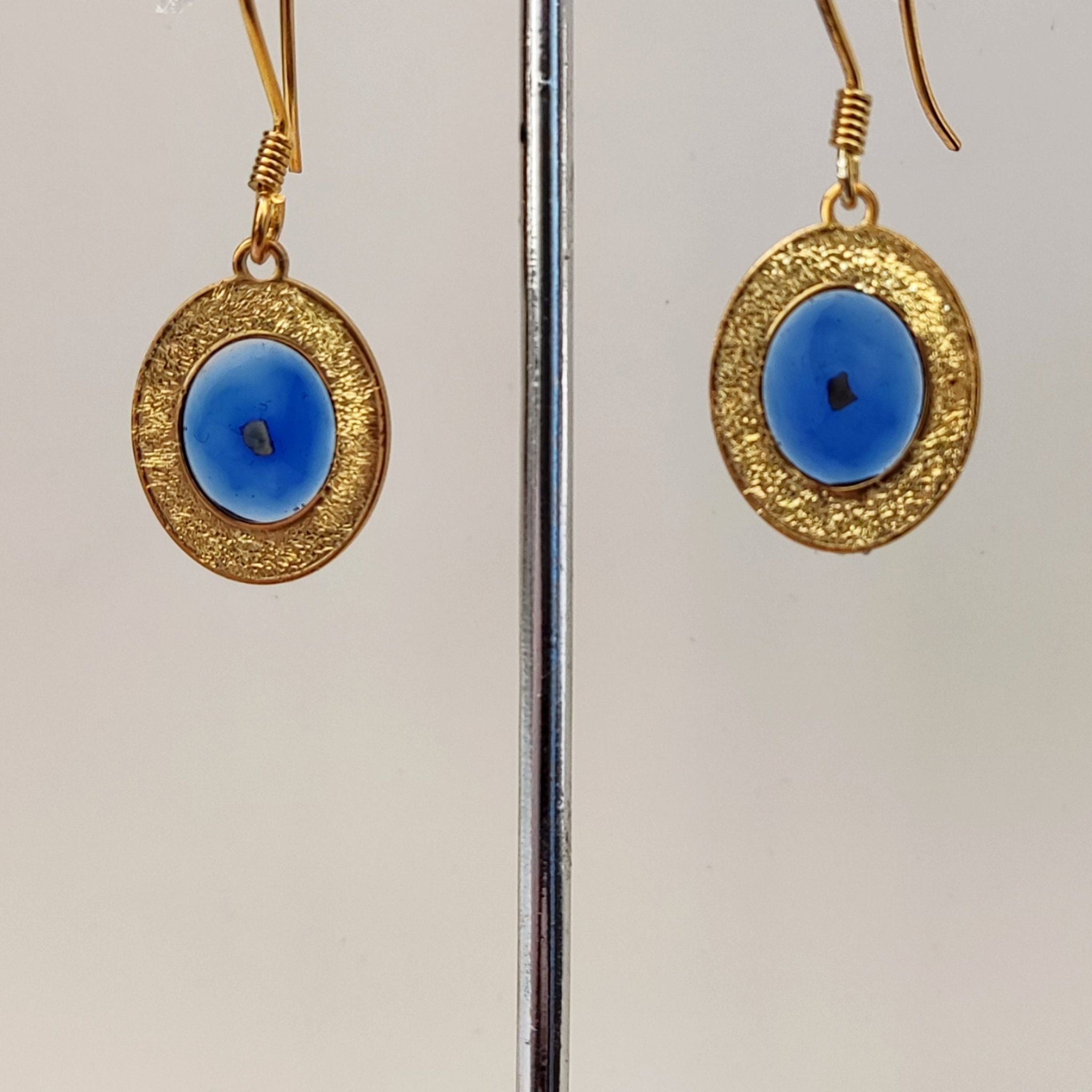 Silver Moon Earrings, crescent design holding a stone from a Palestinian city, handmade in Ramallah
