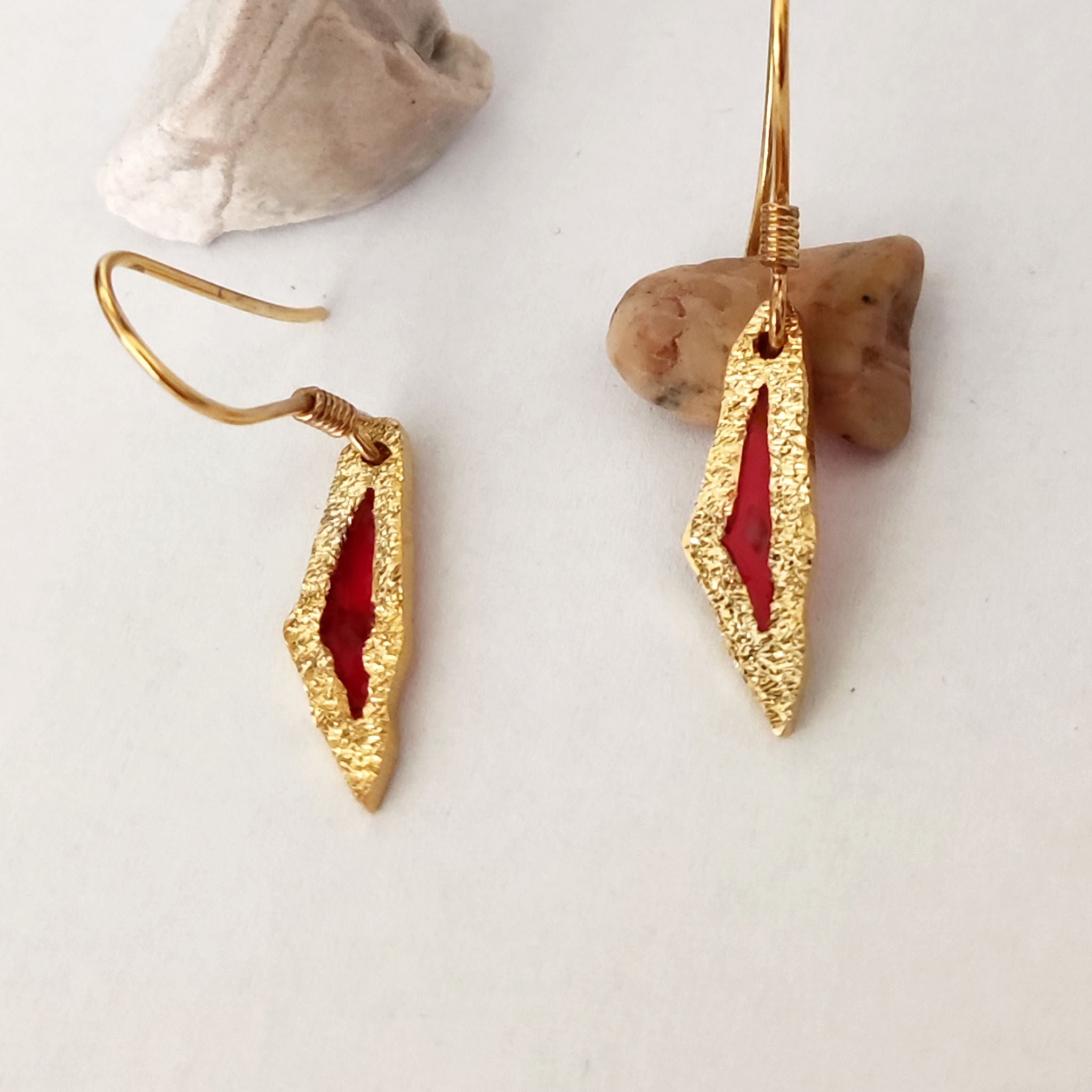 Close-up of the Palestine map earrings in sterling gold