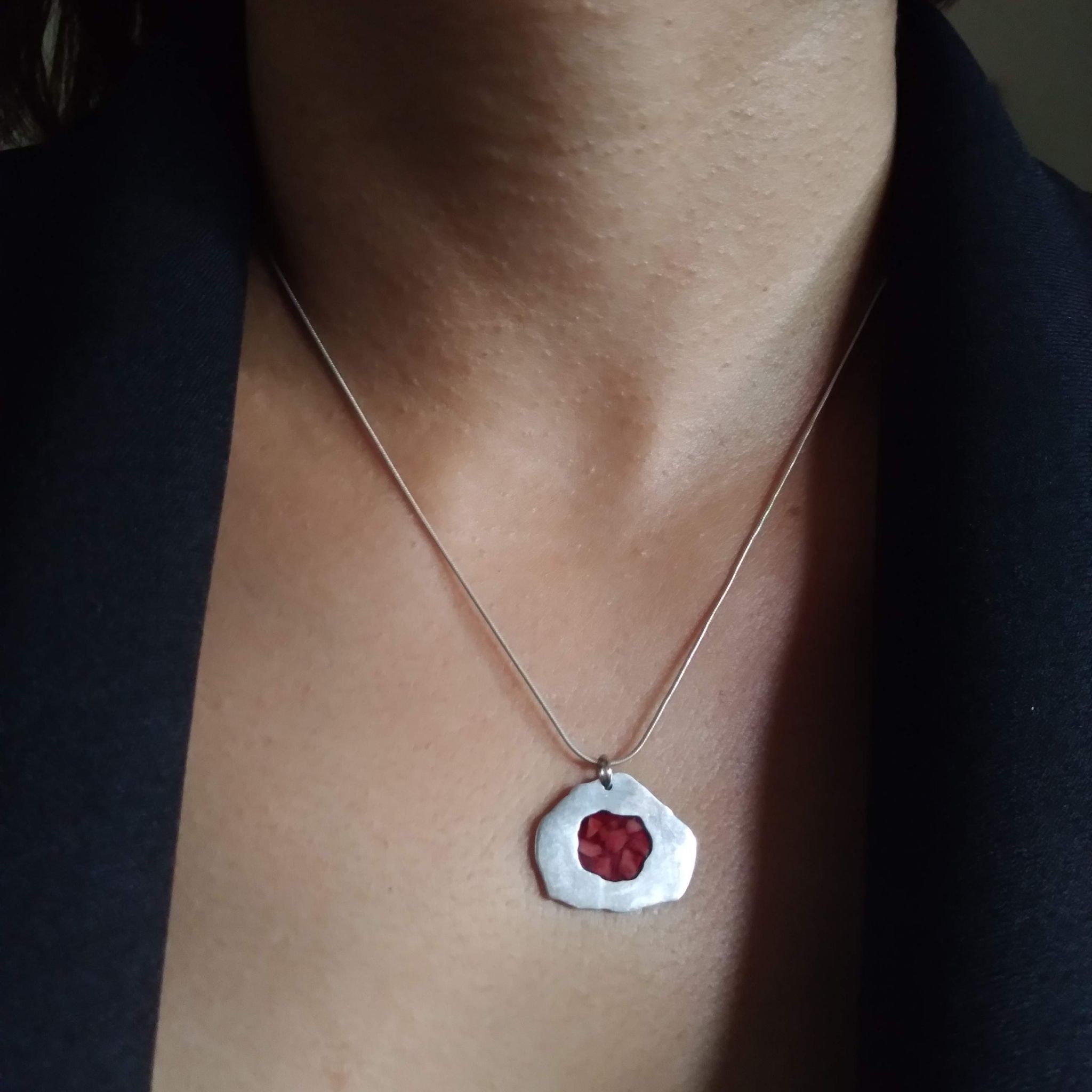Woman wearing The Stone Necklace, showing how it sits when worn